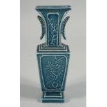 A CHINESE TURQUOISE GLAZE TWIN HANDLE VASE, 18.5cm high.