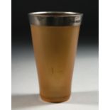 A BOVINE HORN BEAKER WITH SILVER BAND, 9.5cm high.