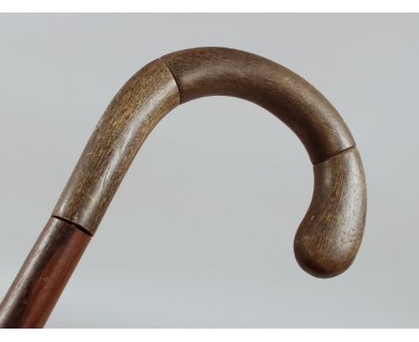 AN ANTIQUE RHINO HORN WALKING STICK, 85cm long.**Please note:&nbsp; this item can only be sold within the UK**