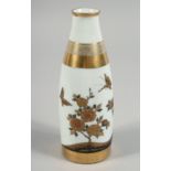 A SMALL JAPANESE PORCELAIN VASE, with gilt work decoration depicting flowers and butterflies, signed