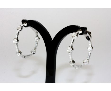 A pair of .925 silver and stone set large hoop earrings (diam 3cm)