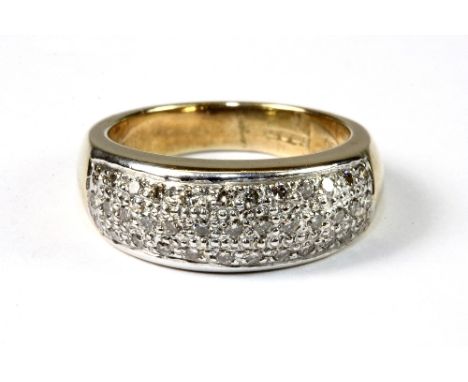 A heavy 9ct gold pave set diamond ring (L)