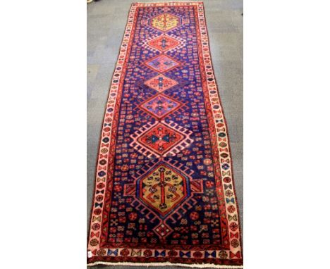 Hand woven blue ground Iranian wool runner 320cm x 103cm