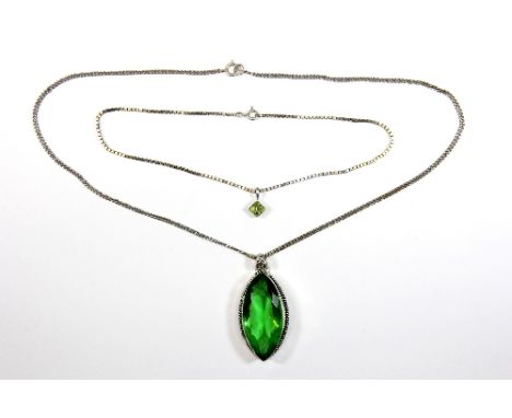 A large .925 silver mounted green stone pendant and chain + peridot pendant and chain