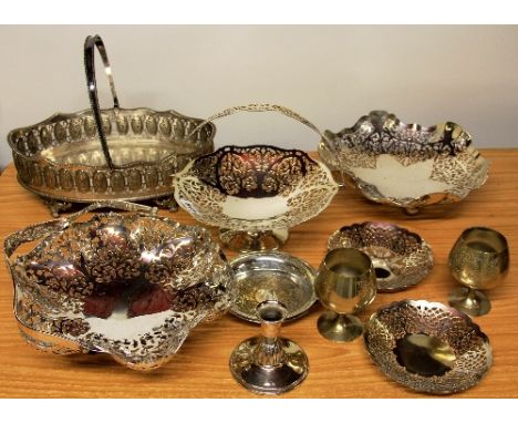 An Edwardian silver plated basket and other silver plated items.