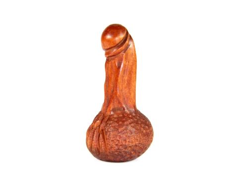 An erotic carved fruitwood netsuke