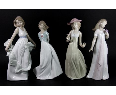 4 Nao girl figurines with boxes