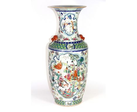 A large 19th/Early 20thC Chinese hand enamelled porcelain vase decorated with scenes of the Imperial Court. H:57cm