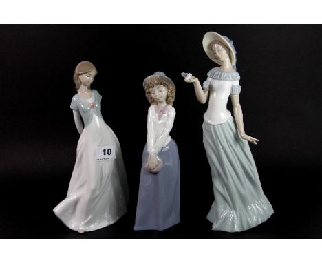 3 Nao Figurines with boxes