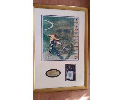 FOOTBALL, signed  colour photo (11.75 x 14) by Roberto Carlos, overmounted above photo of him holding the frame and small pla