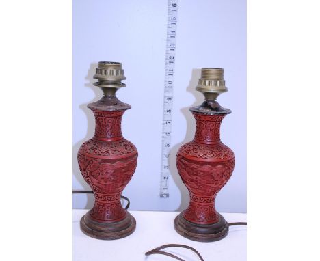 A pair of cinnabar Chinese lamp bases 