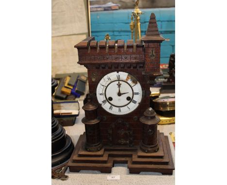A antique wooden cased mantle clock a/f. postage unavailable 