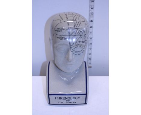 A ceramic Phrenology head 