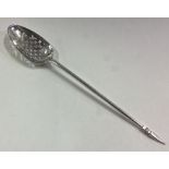 An 18th Century silver mote spoon.