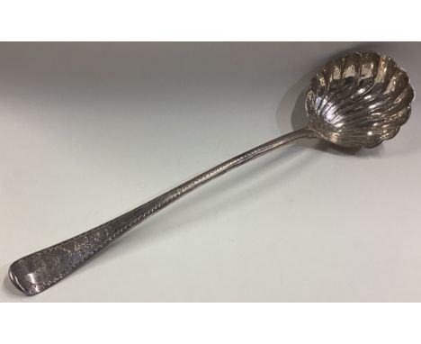 An early 18th Century Queen Anne silver soup ladle. London 1697. By VP. Approx. 160 grams. Est. £300 - £400.