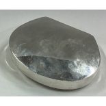 A shaped plain silver snuff box.