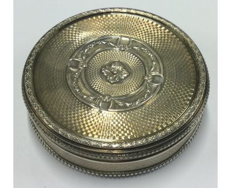 A 19th Century French silver snuff box with engraved decoration to lift-off cover and gilt interior. Approx. 71 grams. Est. £