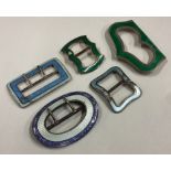 A mixed lot of silver and enamelled buckles.