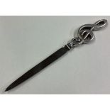 OF MUSICAL INTEREST: A rare silver letter opener.
