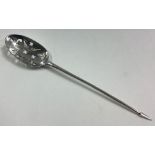 An 18th Century silver mote spoon.