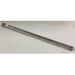 CHESTER: A large silver measurer.