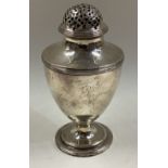 An 18th Century Georgian silver sugar caster.