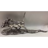 A large Zimbabwean silver figure of a boar.