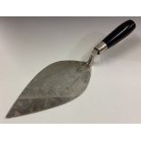 OF LOCAL PLYMOUTH INTEREST: A large silver trowel.
