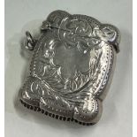 An engraved silver vesta case.