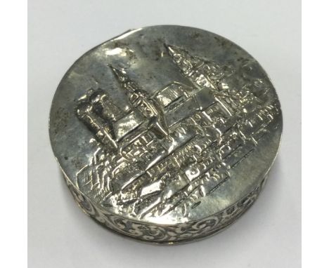 A Continental silver snuff box with hinged cover chased with village scenes. Circa 1900. Approx. 40 grams. Est. £40 - £60.