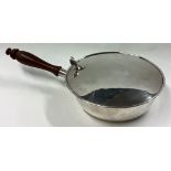 An unusual Sterling silver hinged top brandy pan with turned handle.
