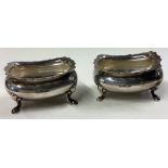 A pair of heavy Edwardian silver salts.