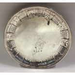 A silver teapot stand.