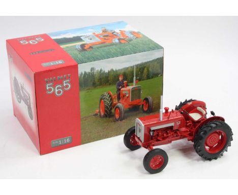 A Universal Hobbies No. 2620 1/16 scale model of a Valmet 565 tractor finished in red, housed in the original polystyrene pac