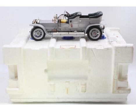 A Franklin Mint 1/12 scale Connoisseur Series model of a 1907 Rolls Royce Silver Ghost, premier edition, comprising silver bo
