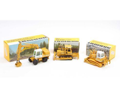 A collection of Liebherr Conrad 1/50 scale construction diecast group to include a No. 2801 Liebherr PR731 crawler dozer toge