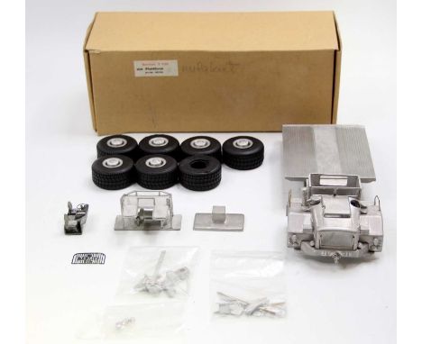 A 1/50 scale white metal kit for a Berliet T100 platform lorry housed in a buff coloured card box with label to read 'Article