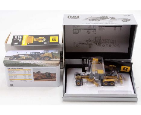A diecast Masters Real Replicas 1/125 scale and H0 scale boxed diecast group to include a No. 85520 Caterpillar 12M3 motor gr