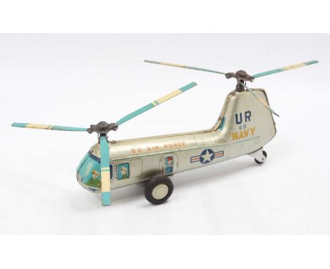TN Nomura tinplate and friction drive model of a US Air Force No.68 Helicopter, silver with blue detailing and white star to 