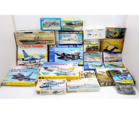 Two boxes of mixed scale military plastic kits to include Heller, Revell, Frog and others, to include an IBG Models Bedford Q
