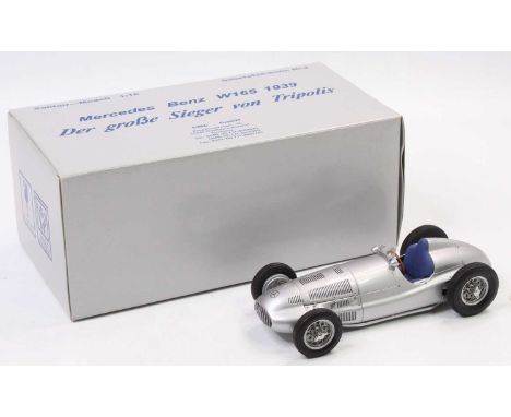 A CMC No. M-018 1/18 scale model of a Mercedes Benz W165 1939 race car finished in silver, housed in the original polystyrene