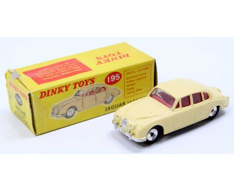 Dinky Toys No. 195 Jaguar 3.4 MkII saloon, in cream with red interior, gloss black base, and spun hubs, minor paint lifting t