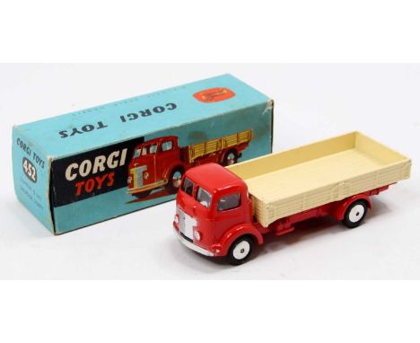 Corgi Toys No. 452 Commer 5 ton dropside lorry comprising red cab and chassis with cream back and flat spun hubs in the origi