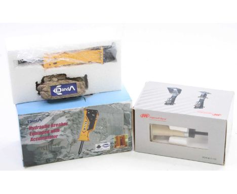 A pair of D&amp;A and Ingersoll Rand 1/10 scale construction attachment group to include a D&amp;A Heavy Industries Company L