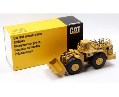 An NZG No. 366 1/50 scale model of a Caterpillar 994 wheel loader housed in the original polystyrene packed and card sleeve b