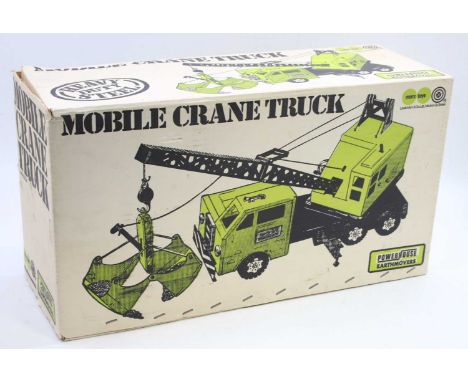 A Marx Toys No.2734 tinplate and pressed steel model of a mobile crane truck, comprising light green and grey body, with grab