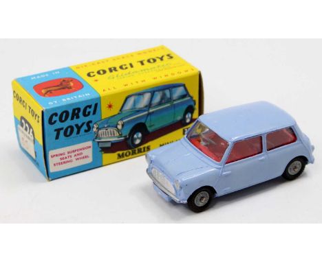 Corgi Toys No. 226 Morris Mini Minor comprising of light blue body with red interior and detailed hubs housed in the original