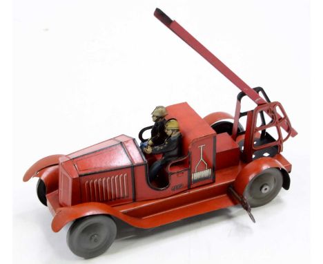 A JEP - Jouet en Paris Toys tinplate and clockwork Fire Engine comprising a red tinplate body with detailing, red tilting lad