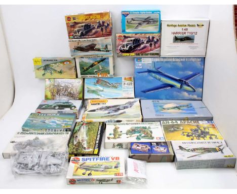 Two boxes of boxed military plastic and resin kits to include Trumpeter, Heller, Italeri and others, to include a Tamiya Brit