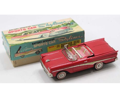 Nomura (T.N. Toys) of Japan tinplate Battery Operated Ford Fairlane Skyliner comprising a red body, with a white retractable 